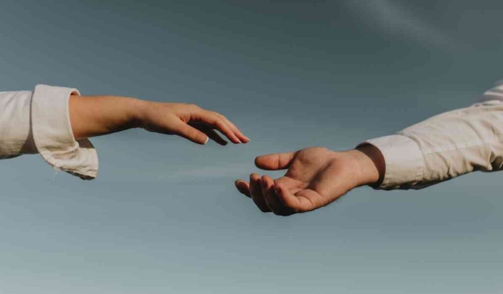 two people holding hands