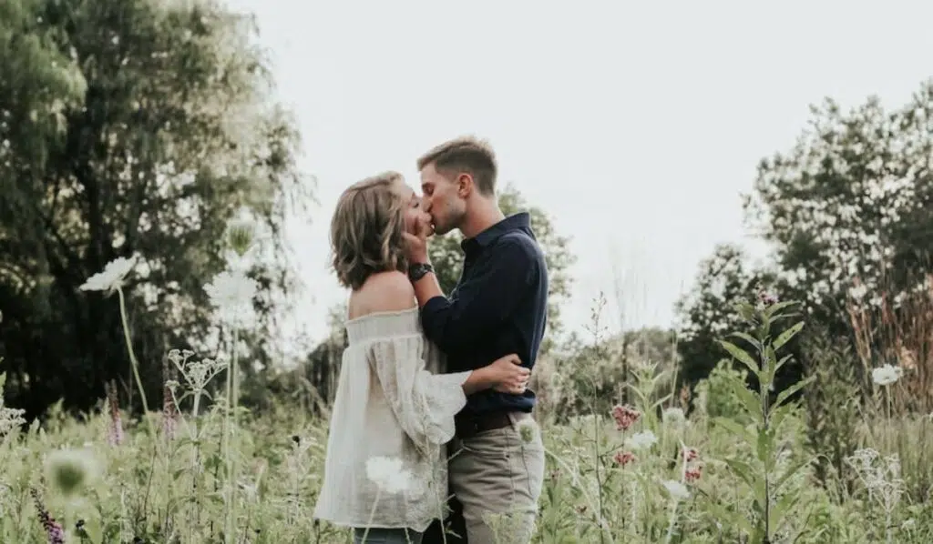 gemini man kissing a woman
