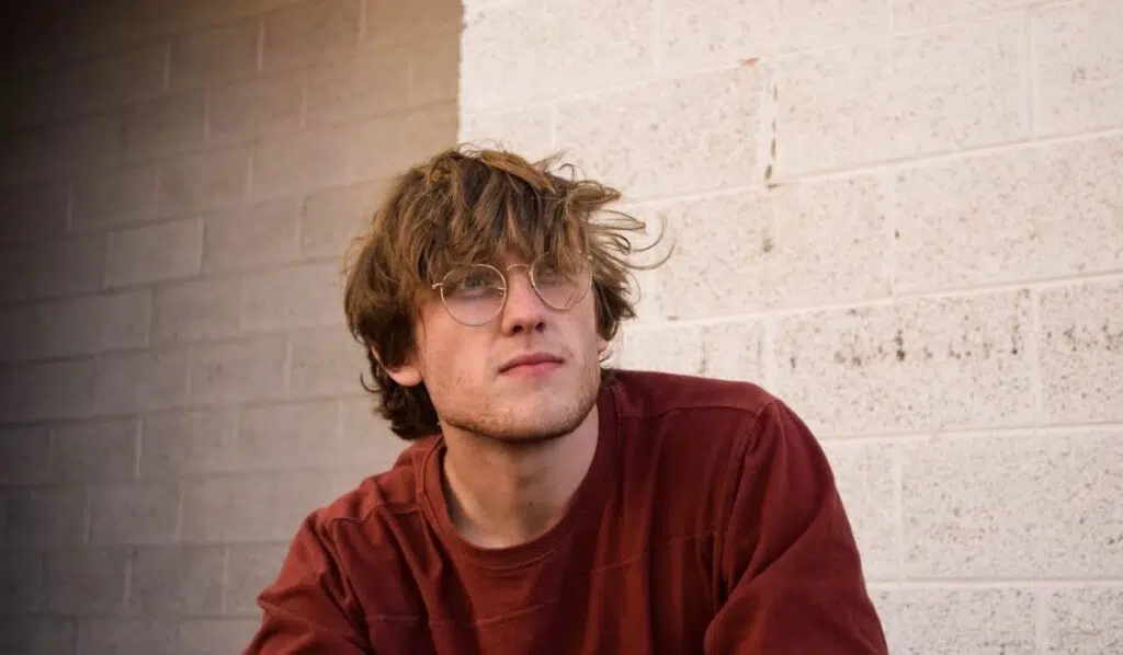 cancer sun cancer moon man wearing glasses