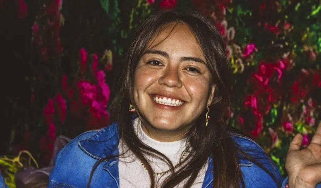cancer sun libra moon woman with a huge smile