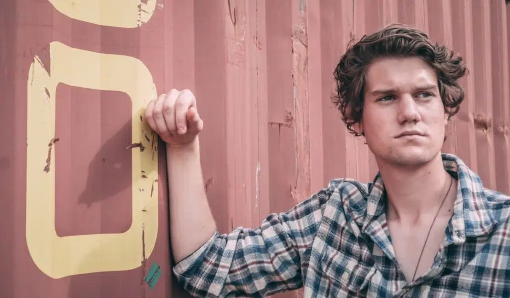 gemini sun cancer moon man with curly hair