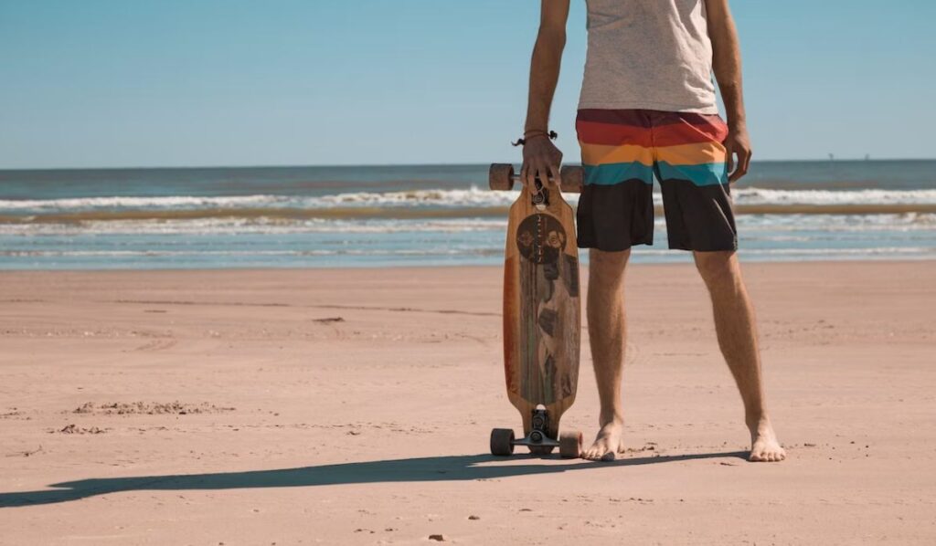 estp man holding a longboard