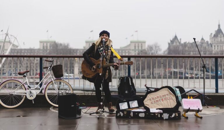 talented aquarius woman performing on the street