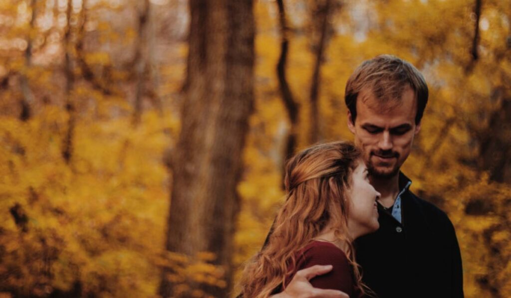 juno conjunct north node couple hugging in a forest