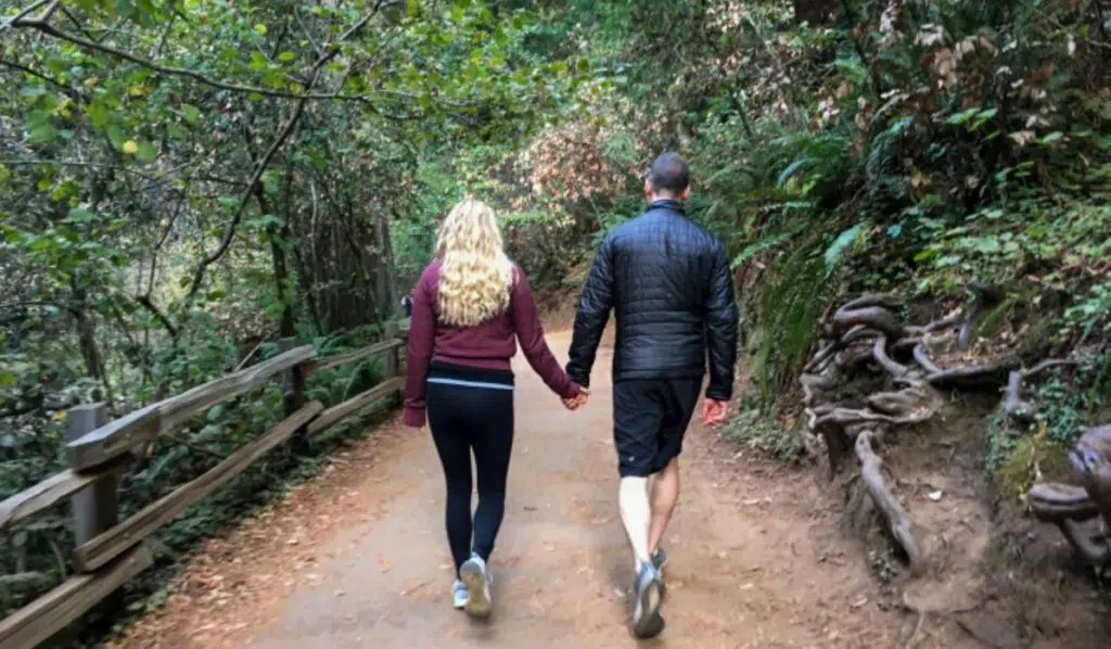 jupiter conjunct north node couple walking on a trail
