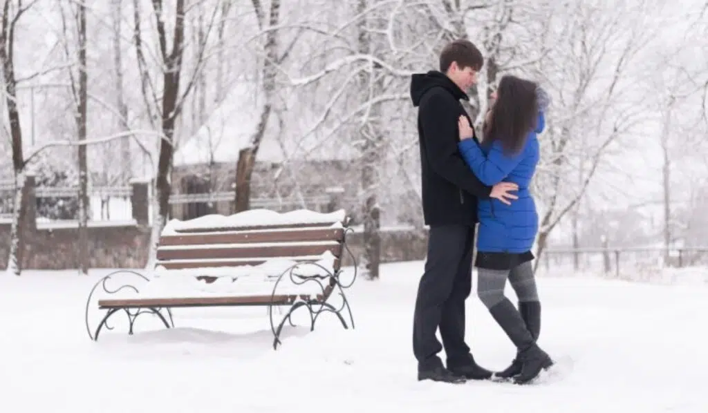 jupiter opposite north node couple kissing in the snow