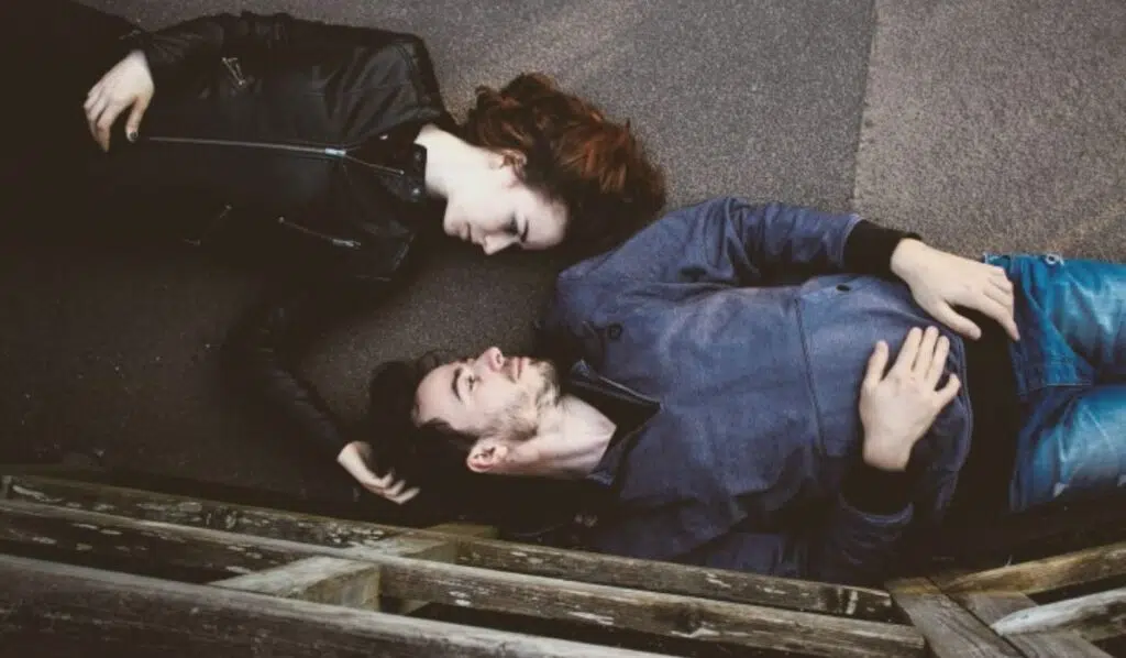 saturn opposite north node couple laying on the ground