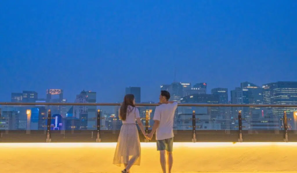 uranus square north node couple holding hands and talking