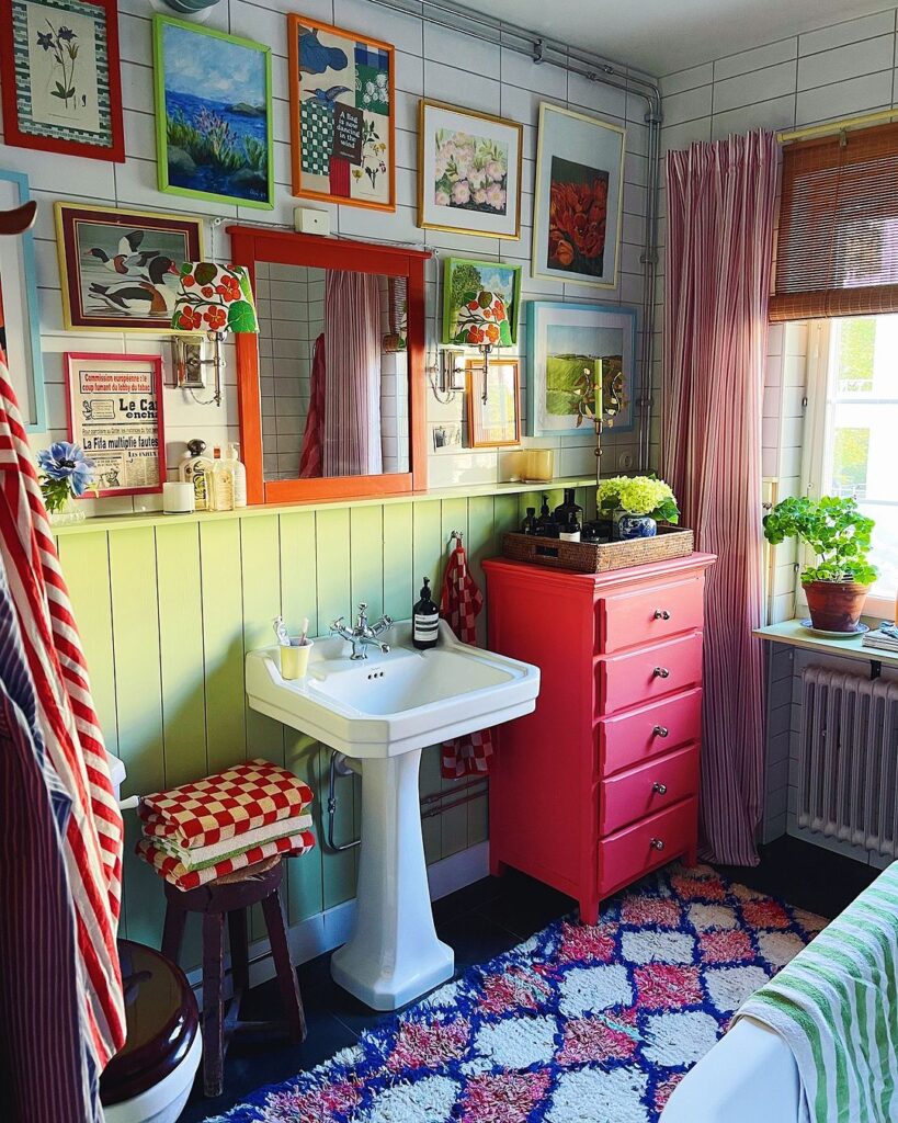 colorful-eclectic-bathroom-gallery-wall-red-cabinet