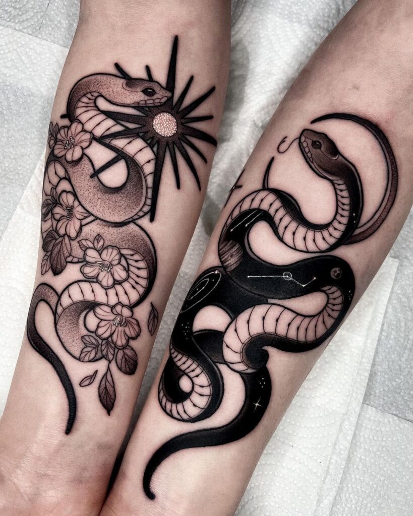 dual-snake-and-sun-tattoo