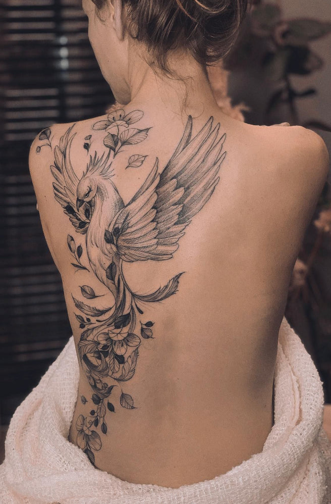 elegant-bird-and-flower-tattoo