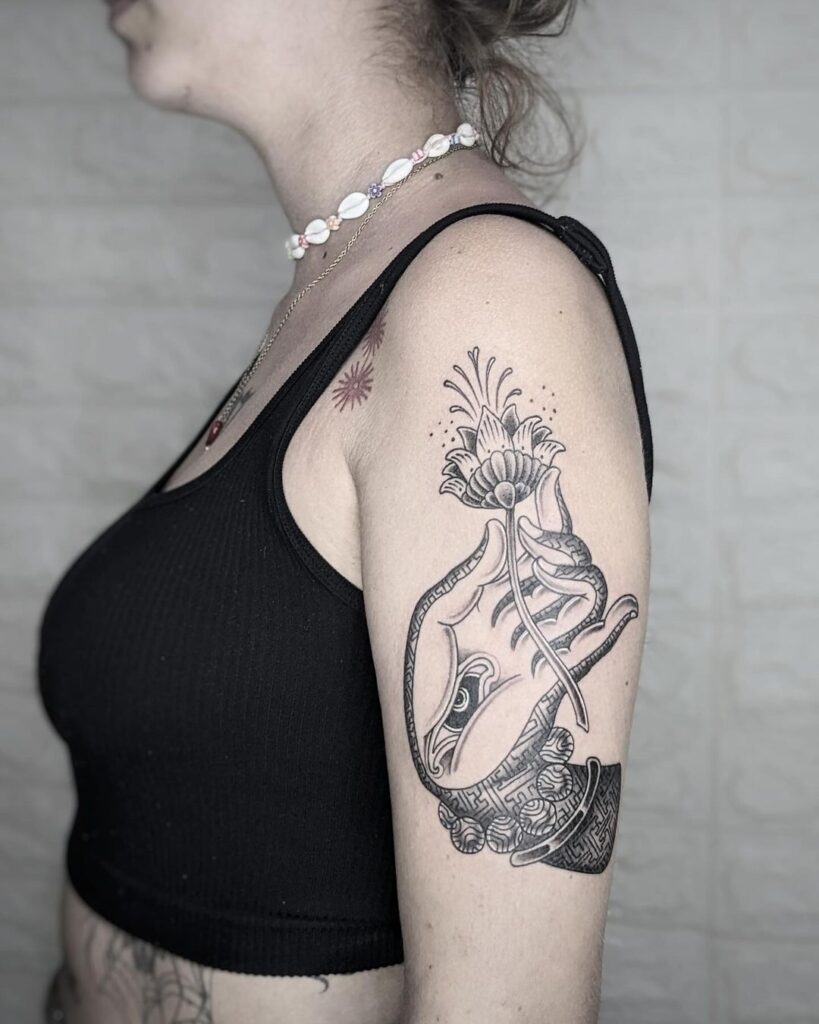 hand-and-flower-tattoo