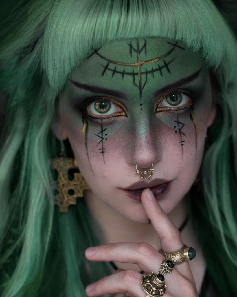 enchanted-green-witch-makeup-tribal-symbols-golden-details