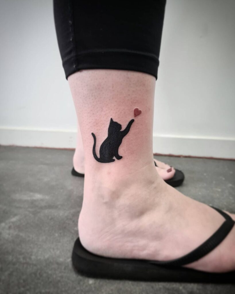 black-cat-heart-ankle-tattoo