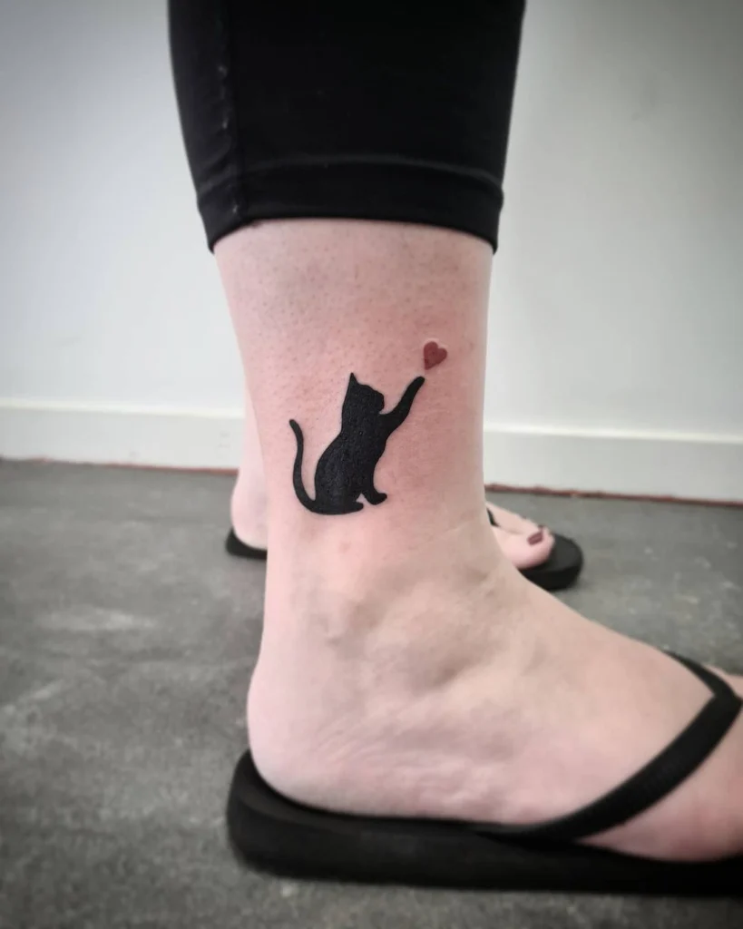 black-cat-heart-ankle-tattoo