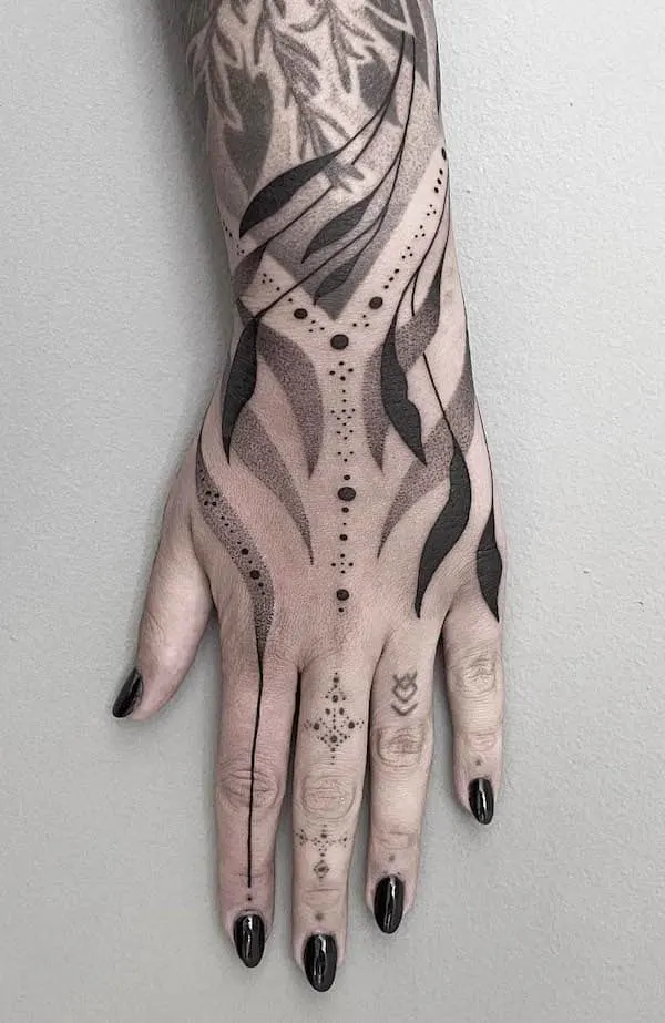 black-foliage-full-hand-tattoo