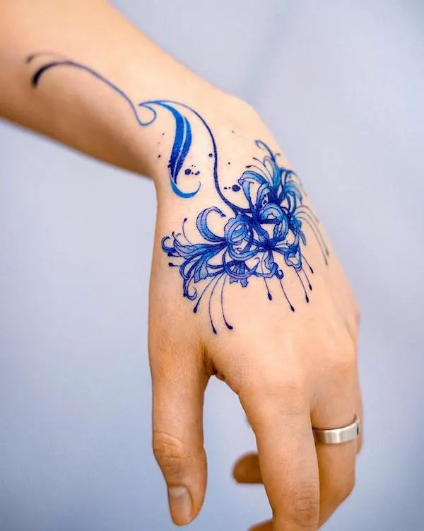 blue-floral-hand-tattoo