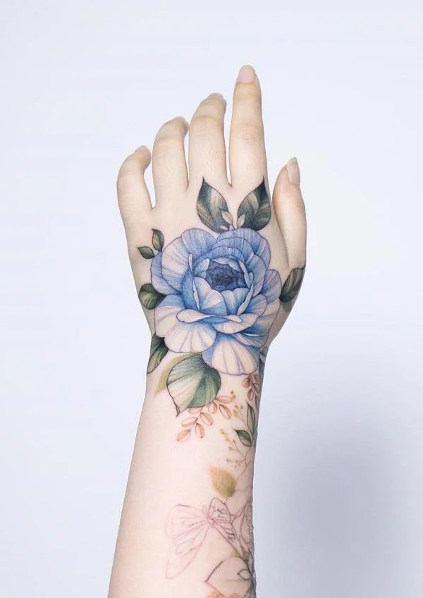 blue-rose-hand-tattoo