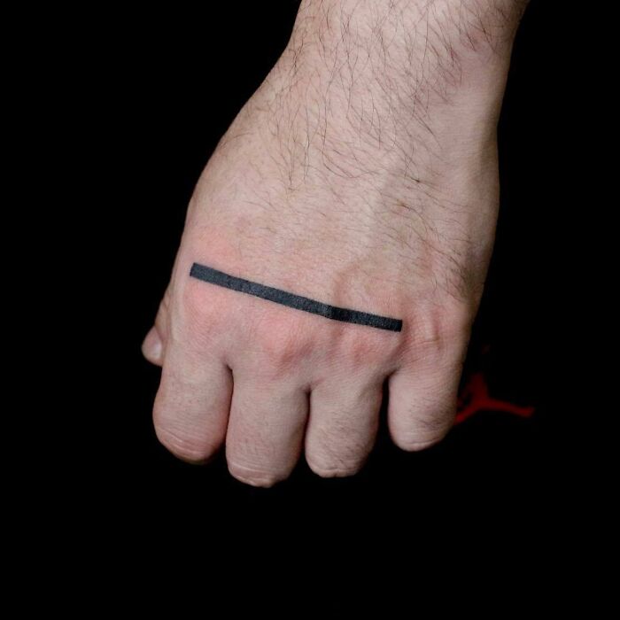 bold-black-line-hand-tattoo-minimalist