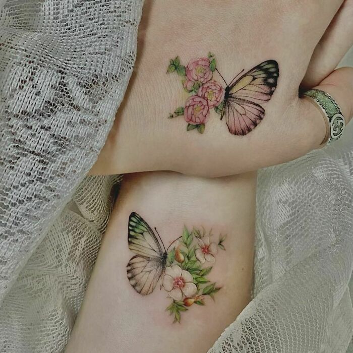 butterfly-and-floral-hand-tattoo-colorful-design