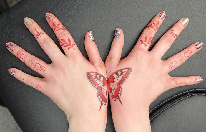 butterfly-and-floral-hand-tattoo