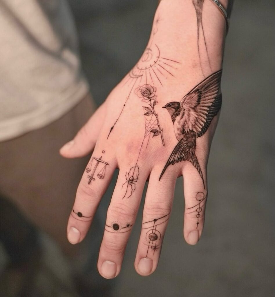 celestial-sparrow-hand-tattoo