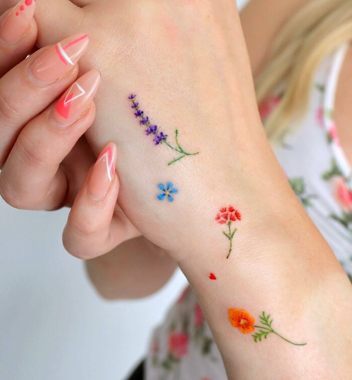 colorful-floral-hand-tattoo-botanical-design