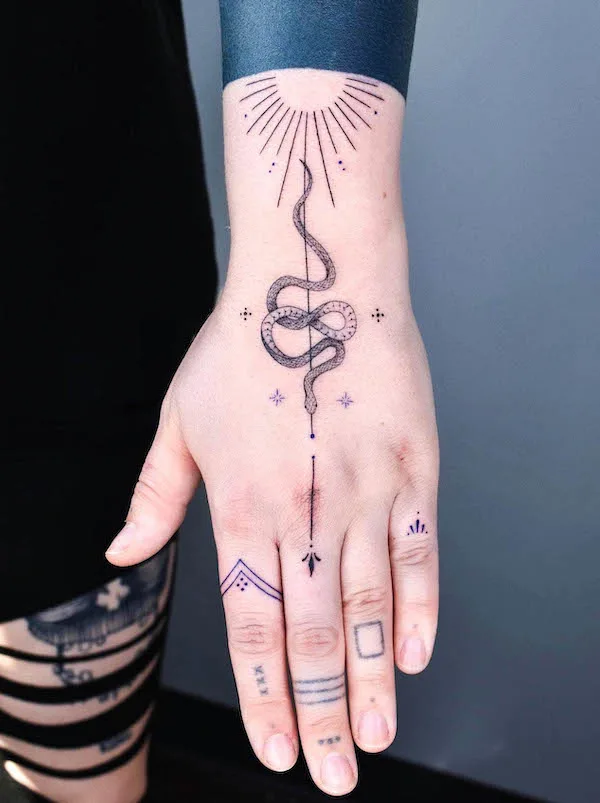 cosmic-snake-hand-tattoo