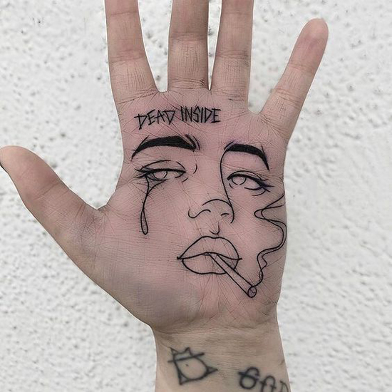 dead-inside-palm-tattoo