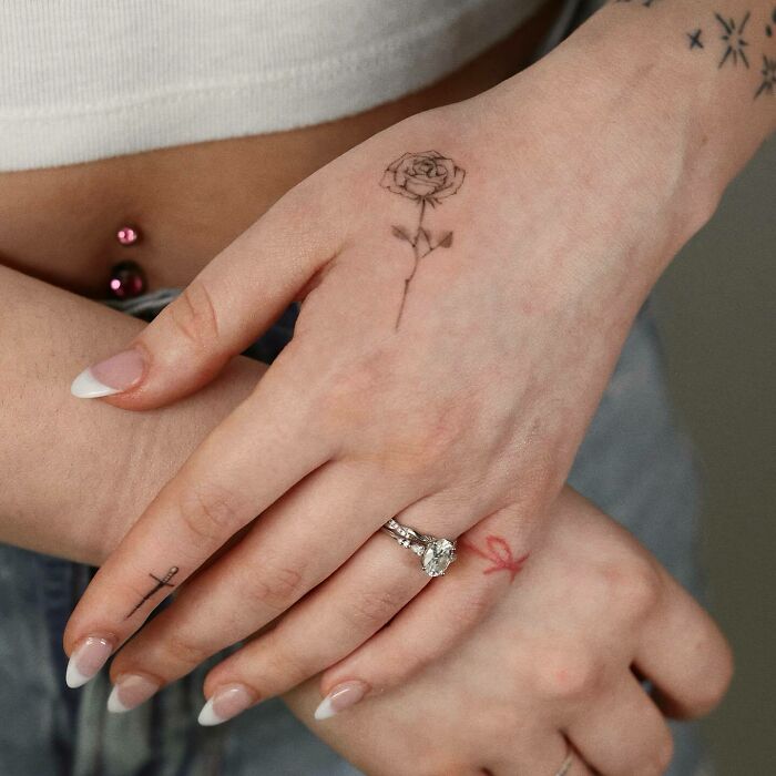 delicate-hand-tattoo-rose-and-cross