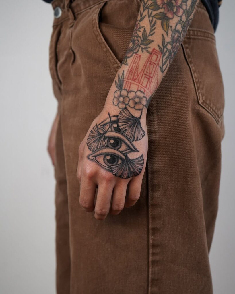 eyes-ginkgo-hand-tattoo