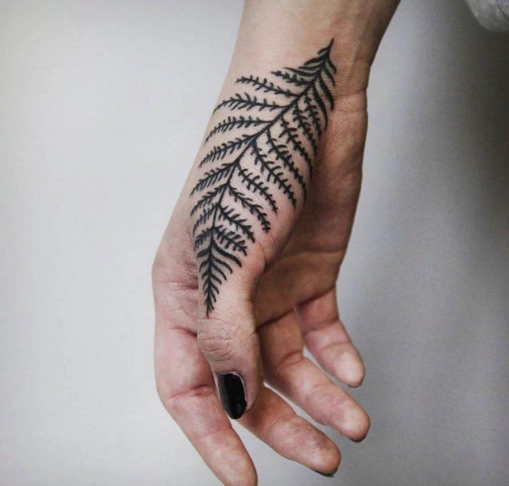 fern-leaf-hand-tattoo