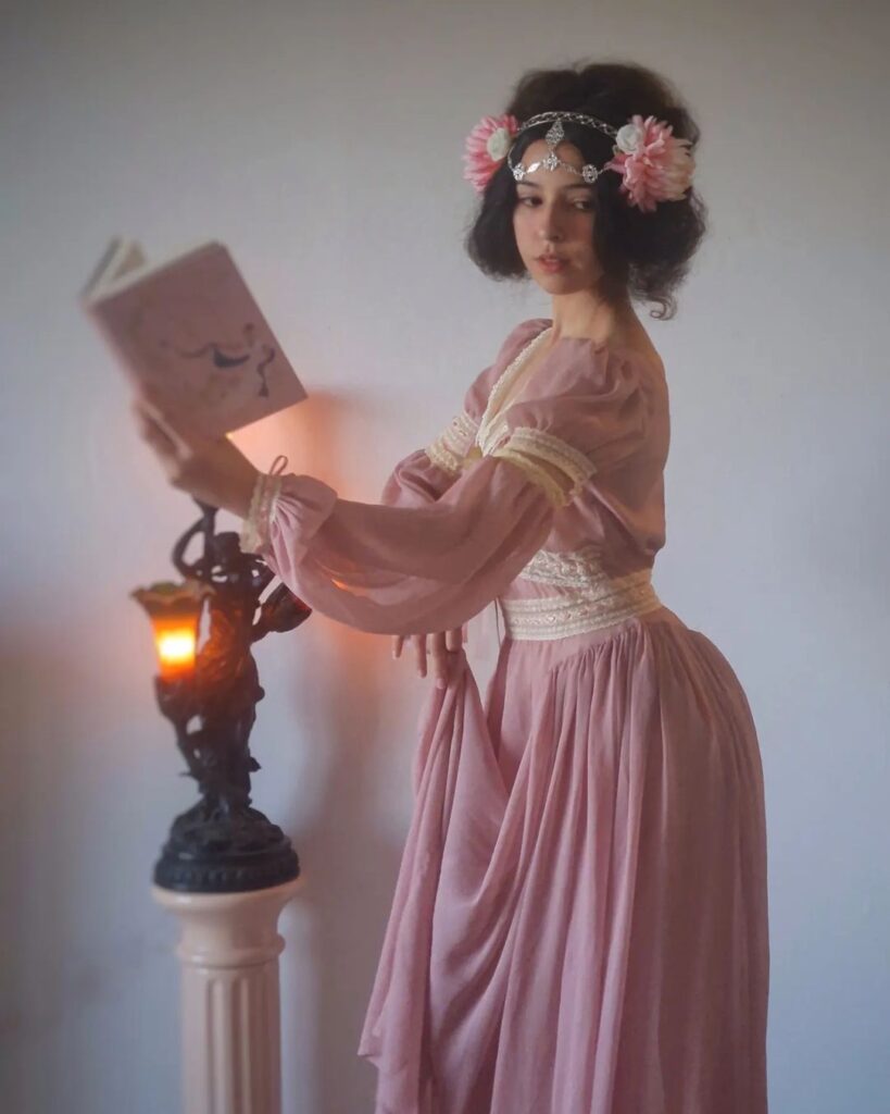 flowing-pink-gown-with-floral-headpiece-and-vintage-aesthetic