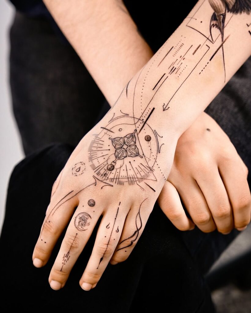 geometric-space-hand-tattoo