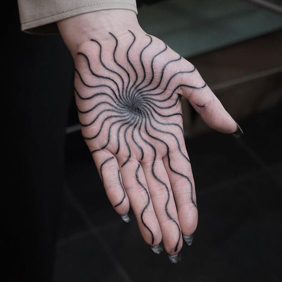 hypnotic-swirl-palm-tattoo