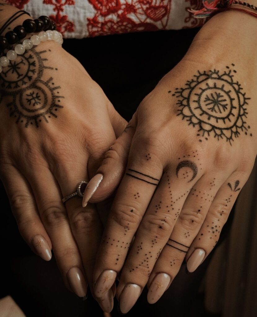 mandala-sun-moon-hand-tattoo