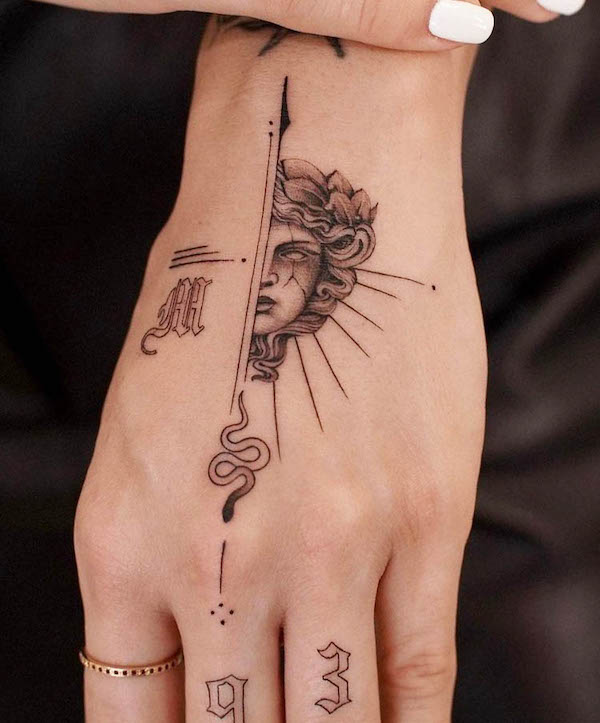 medusa-and-arrow-hand-tattoo