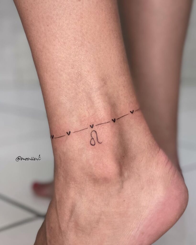 minimal-heart-initial-ankle-tattoo