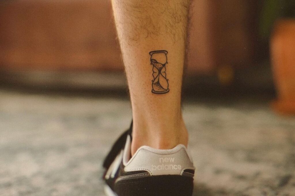 minimalist-hourglass-ankle-tattoo