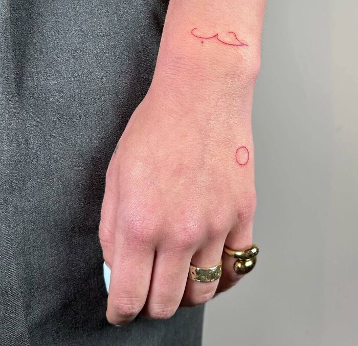 minimalist-red-ink-hand-tattoo-symbols