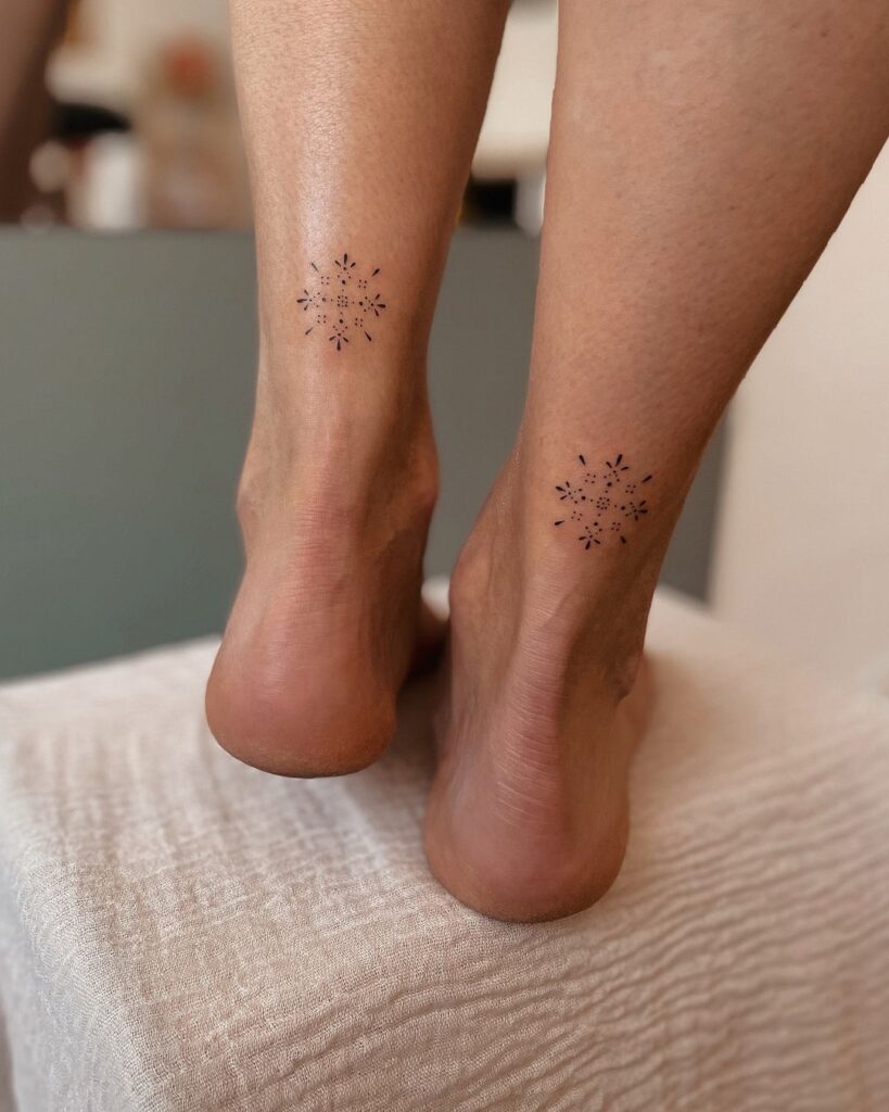 minimalistic-ankle-dot-tattoo-snowflake-style