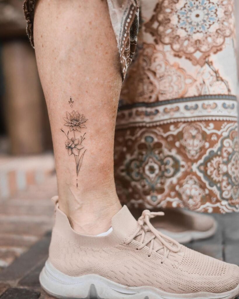 minimalistic-floral-ankle-tattoo-modern-charm