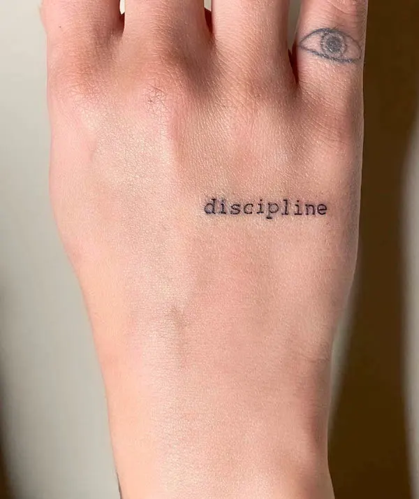 one-word-hand-tattoo