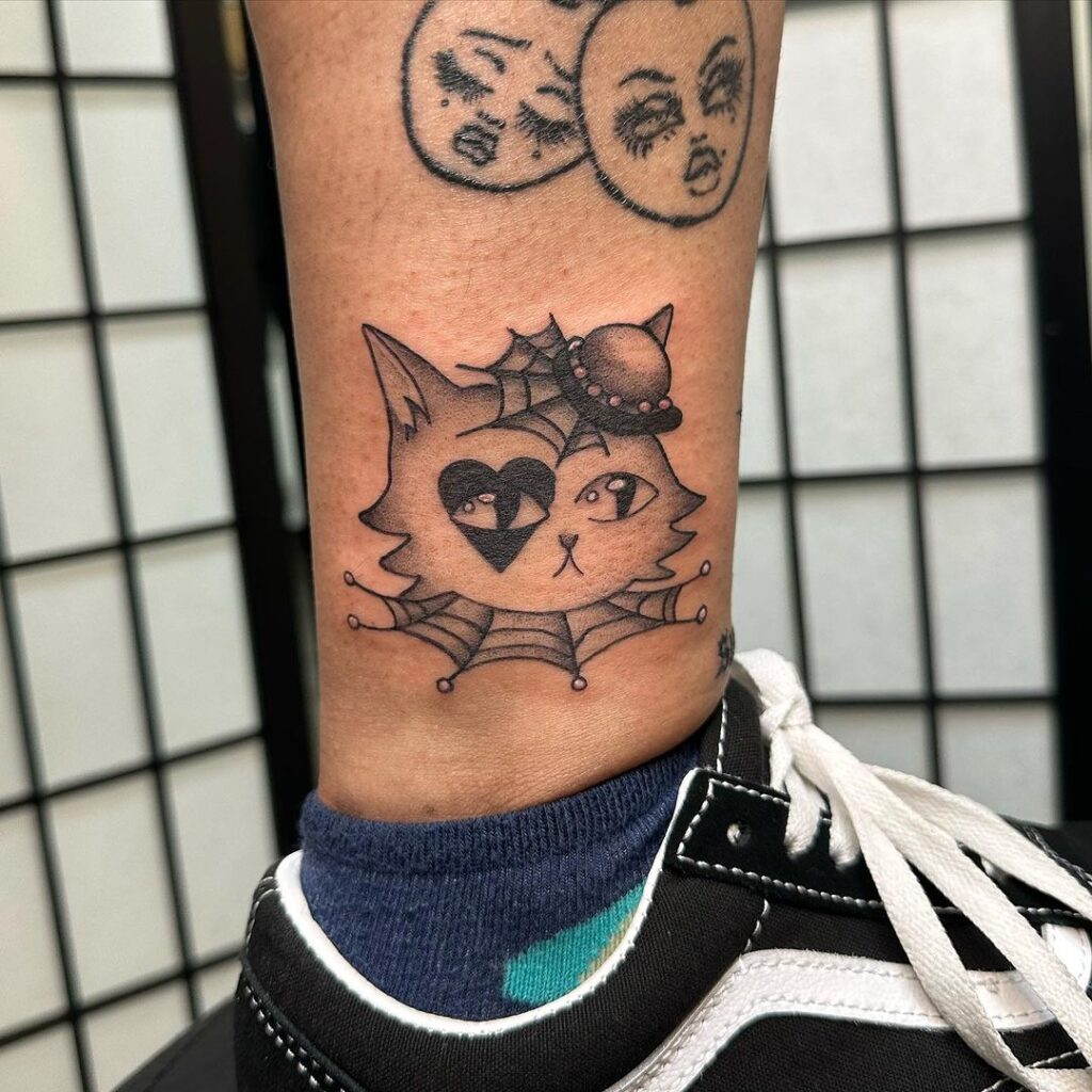 quirky-cat-ankle-tattoo