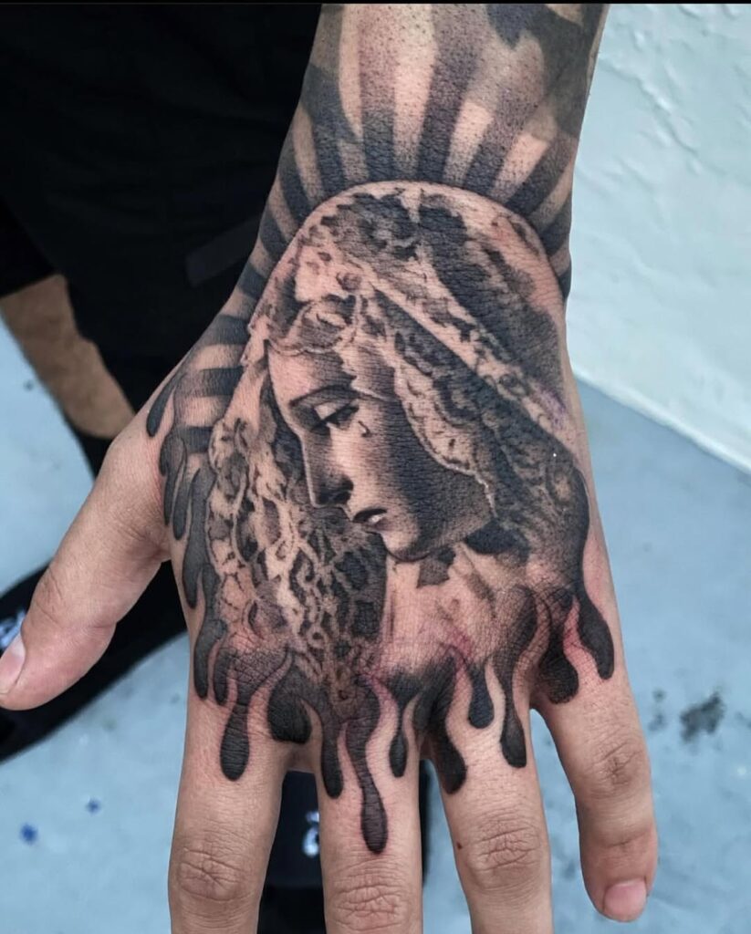 religious-portrait-hand-tattoo