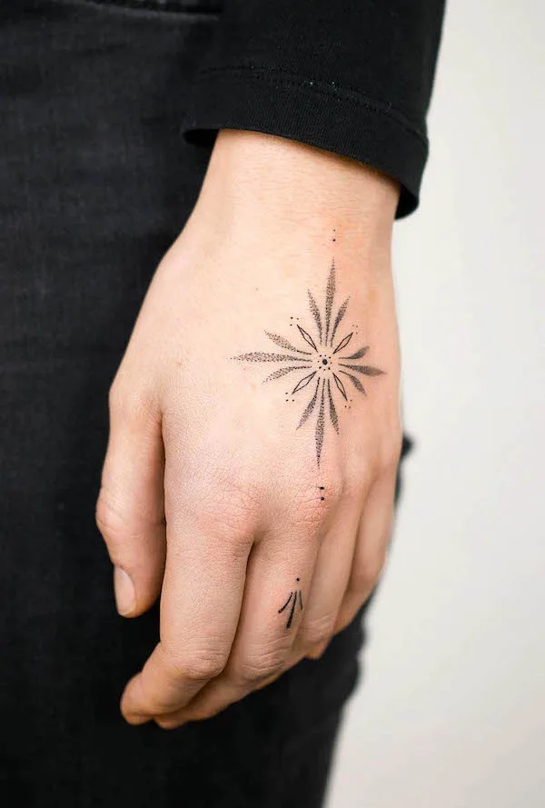 starburst-ornament-hand-tattoo