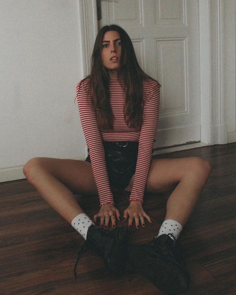 striped-top-with-leather-shorts-and-combat-boots