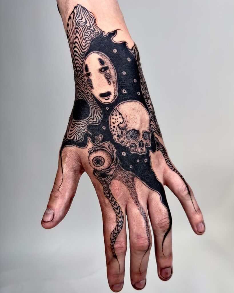 surreal-nightmare-hand-tattoo