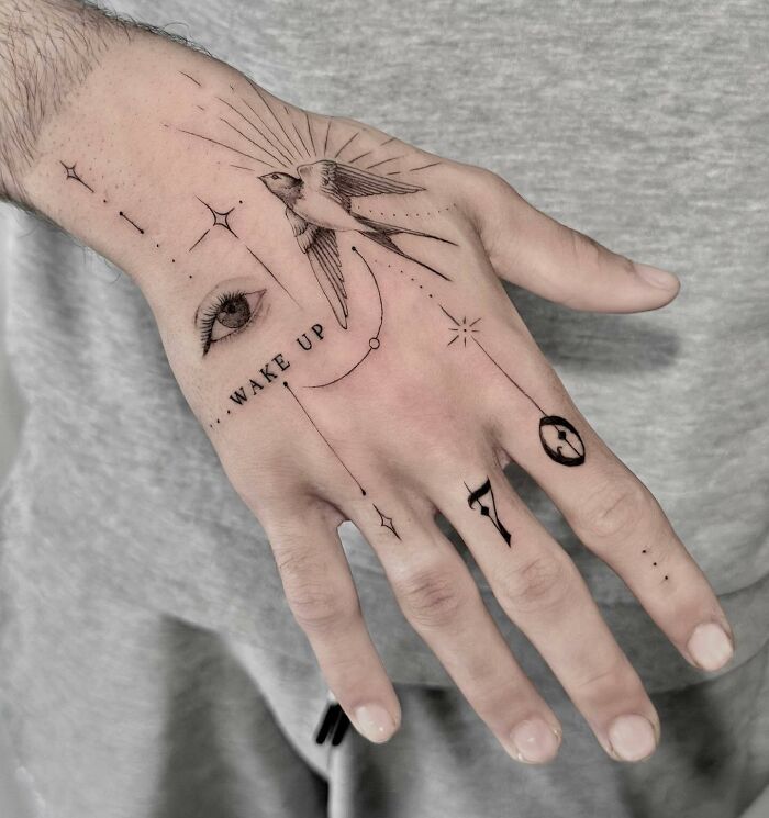 wake-up-symbolic-hand-tattoo