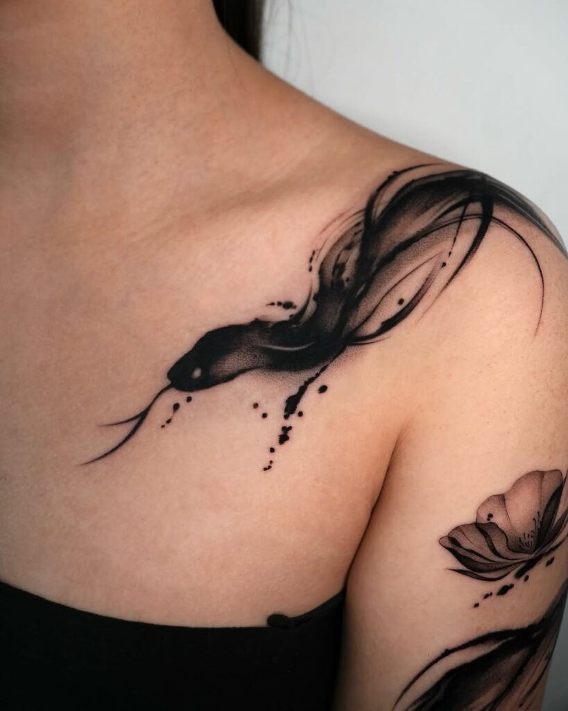 abstract-snake-collarbone-tattoo